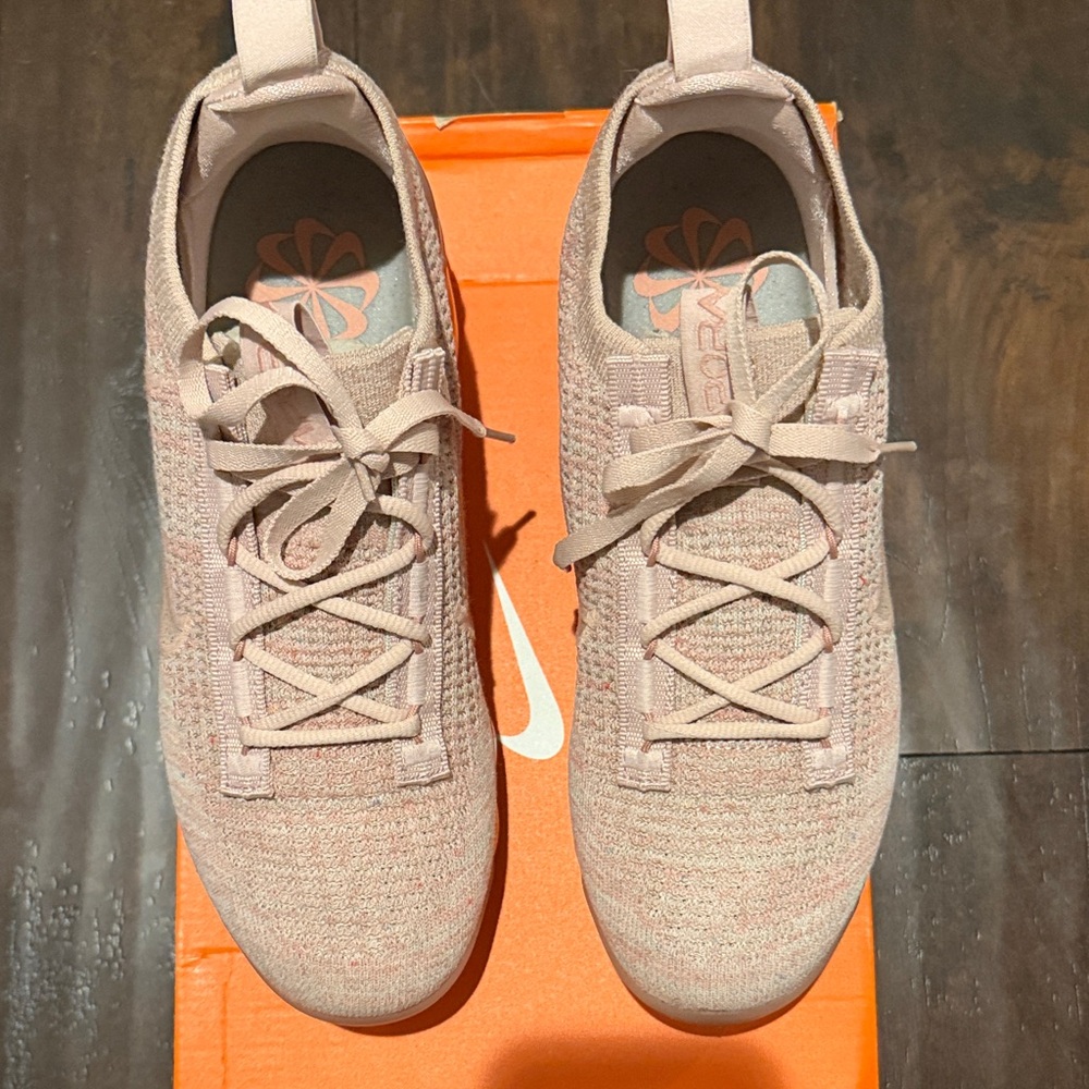 Nike Women's Blush Pink Knit Sneakers